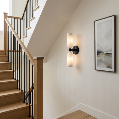 Alvane double bell alabaster wall sconce in black &amp; white on the staircase landing of a suburban house in Salt Lake City, Utah