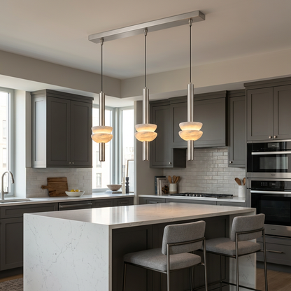 Brontee 3-light linear alabaster pendant in nickel over a Boston condo kitchen island