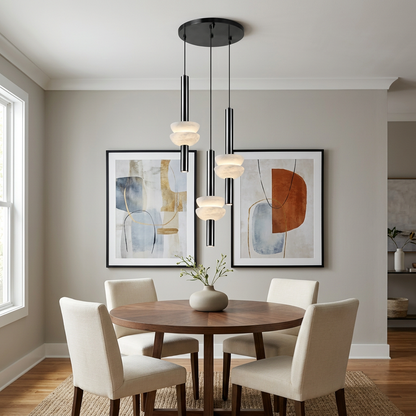 Brontee 3-light round alabaster pendant in black over an Atlanta townhouse dining table