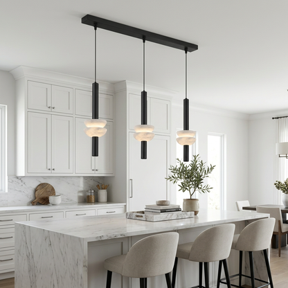 Brontee 3-light linear alabaster pendant in black over a Dallas home kitchen island