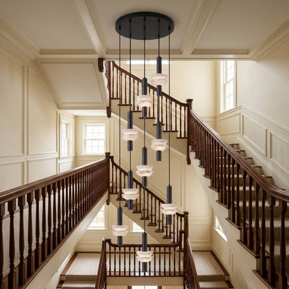 Brontee 9-head alabaster cluster pendant in black in a Boston townhouse stairwell