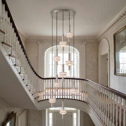 Brontee 9-head alabaster cluster pendant in nickel in a Charleston home curved staircase