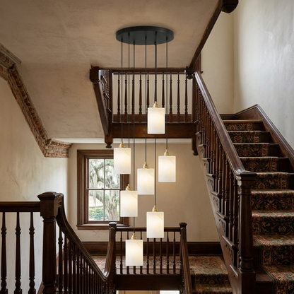 Carmeline Alabaster Cylinder Staircase Chandelier 7-light over a traditional wood staircase
