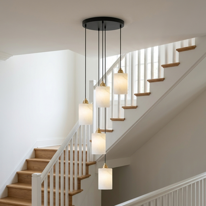 Carmeline Alabaster Cylinder Staircase Chandelier 5-light in a bright modern stairwell